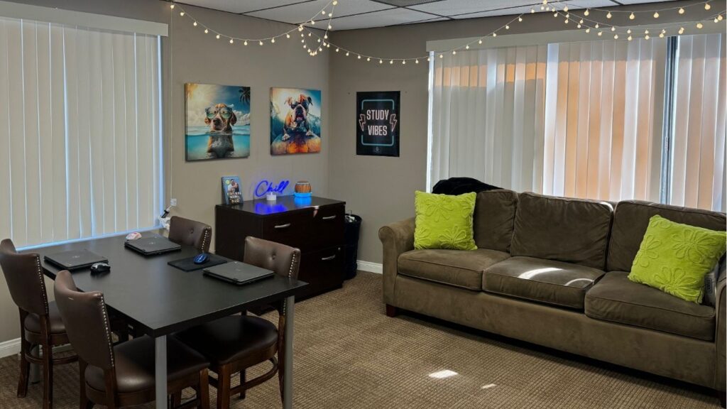 Santa Clarita Resource Center with lights, computers, and a couch for young adults at Finally Family Homes